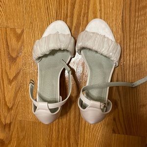 Worn once white heels